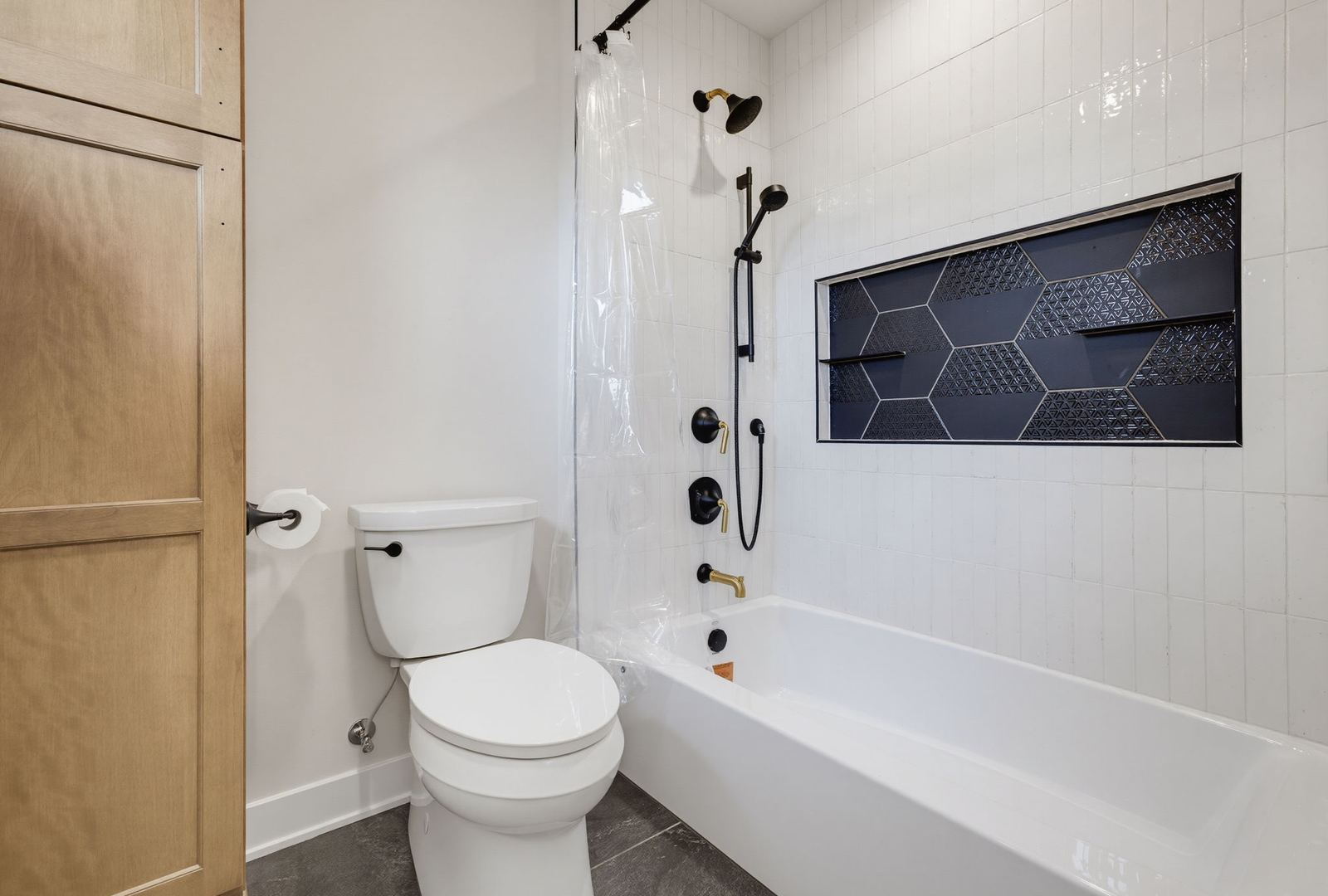 Shower and Tub Installation for a basement remodel by Corinth Basement Remodeling